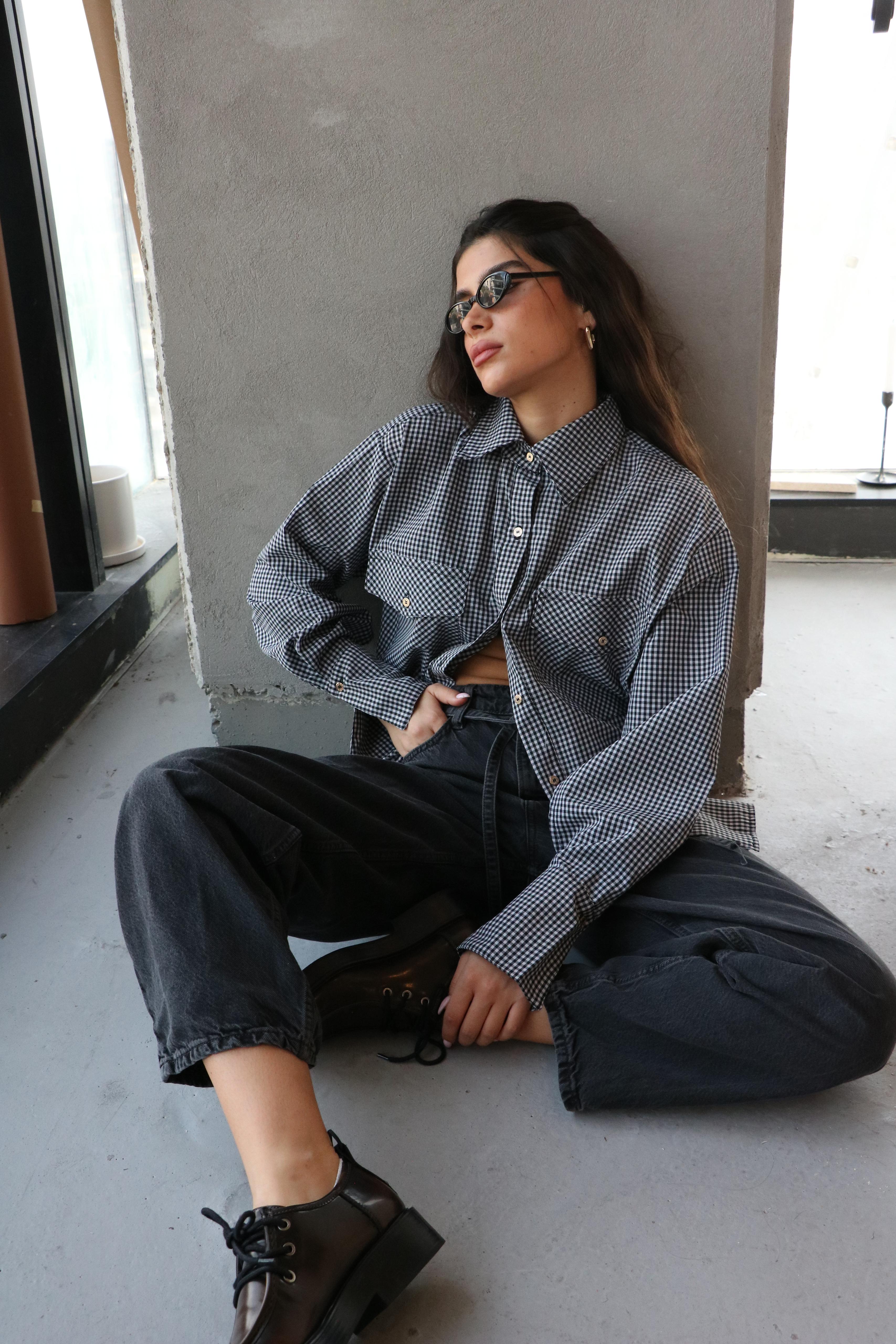 חולצת נריה משובץ שחור