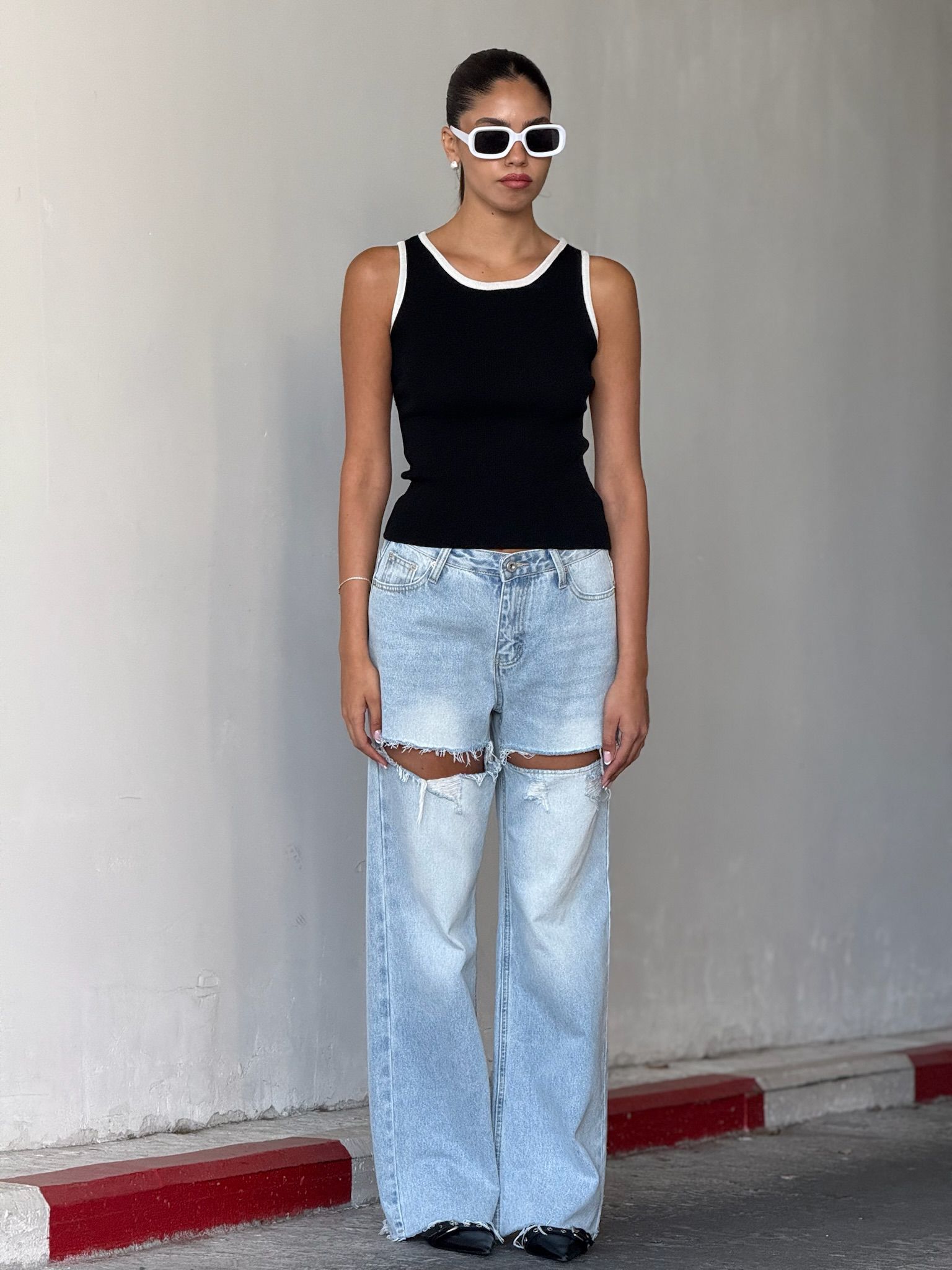 גופיית איב שחור